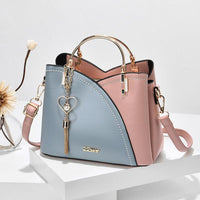 Elegante Damen-Schultertasche aus stilvollem Leder in Blau / Rosa