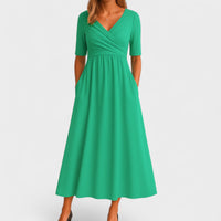 Elegantes Midikleid für Frauen - V-Ausschnitt, Ellbogenlange Ärmel, Praktische Taschen in Grün
