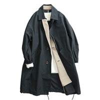 Damen Oversize-Trenchcoat aus atmungsaktivem Baumwollmischgewebe mit verdeckter Knopfleiste Nord Taschen in Schwarz