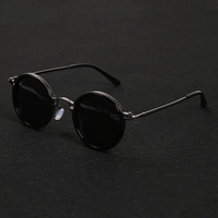 Mette | Zeitlose Runde Sonnenbrille in Schwarz / Schwarz
