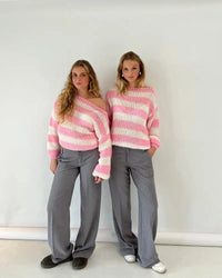 Damen Asymmetrischer Pullover mit strukturierter Oberfläche und langen Ärmeln in Rosa