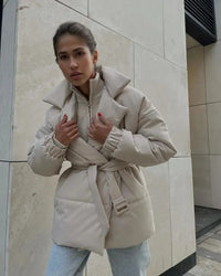 Damen Gesteppte Pufferjacke mit Gürtel breitem Kragen und gerippten Bündchen in Aprikose