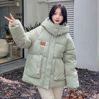 Damen Gesteppte Pufferjacke mit Kapuze Frontreißverschluss Brusttasche und Seitentaschen in Mintgrün