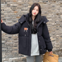 Damen Gesteppte Pufferjacke mit Kapuze Frontreißverschluss Brusttasche und Seitentaschen in Schwarz