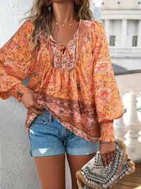 Damen Hemd mit Blumenmuster und V-Ausschnitt in Orange