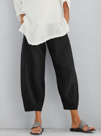 Damen Hose mit elastischem Bund und weiter Beinform in Schwarz