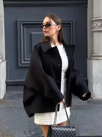 Damen Kurze Jacke mit Knopfverschluss und Umlegekragen in Schwarz