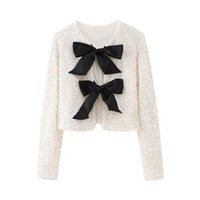 Damen Kurze Jacke mit Paillettenoberfläche und Schleifen in Weiß