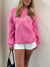 Damen Pullover mit Rundhalsausschnitt langen Ärmeln mit Bündchen und Schleifenstickerei in Rosa