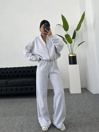 Damen Set Jogginganzug mit Reißverschluss Oberteil und Elastischer Hose und Kordelzug in Hellgrau