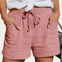 Damen Shorts mit elastischem Bund und Kordelzug sowie aufgesetzten Taschen und umgeschlagenen Säumen in Rosa