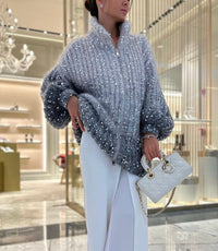 Damen Strickjacke mit Reißverschluss und Stehkragen sowie Paillettenbesatz in Grau