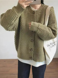 Damen Strickjacke mit Rundhalsausschnitt Knopfverschluss Ballonärmeln und Strukturmuster in Grün