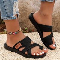 Damen Zehensteg-Sandalen mit Kreuzriemen und Flachboden in Schwarz