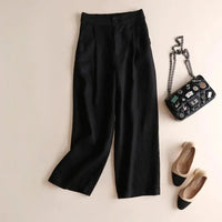 Damenhose mit hohem Bund, weitem Bein, Frontfalten und Seitentaschen in Schwarz
