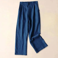 Damenhose mit hohem Bund, weitem Bein, Frontfalten und Seitentaschen in Marineblau