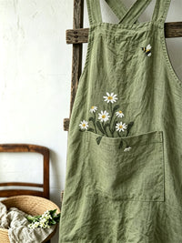 Damen-Schürze aus Leinen im Vintage-Stil mit Gänseblümchen- und Bienendruck sowie aufgesetzter Tasche in Grün